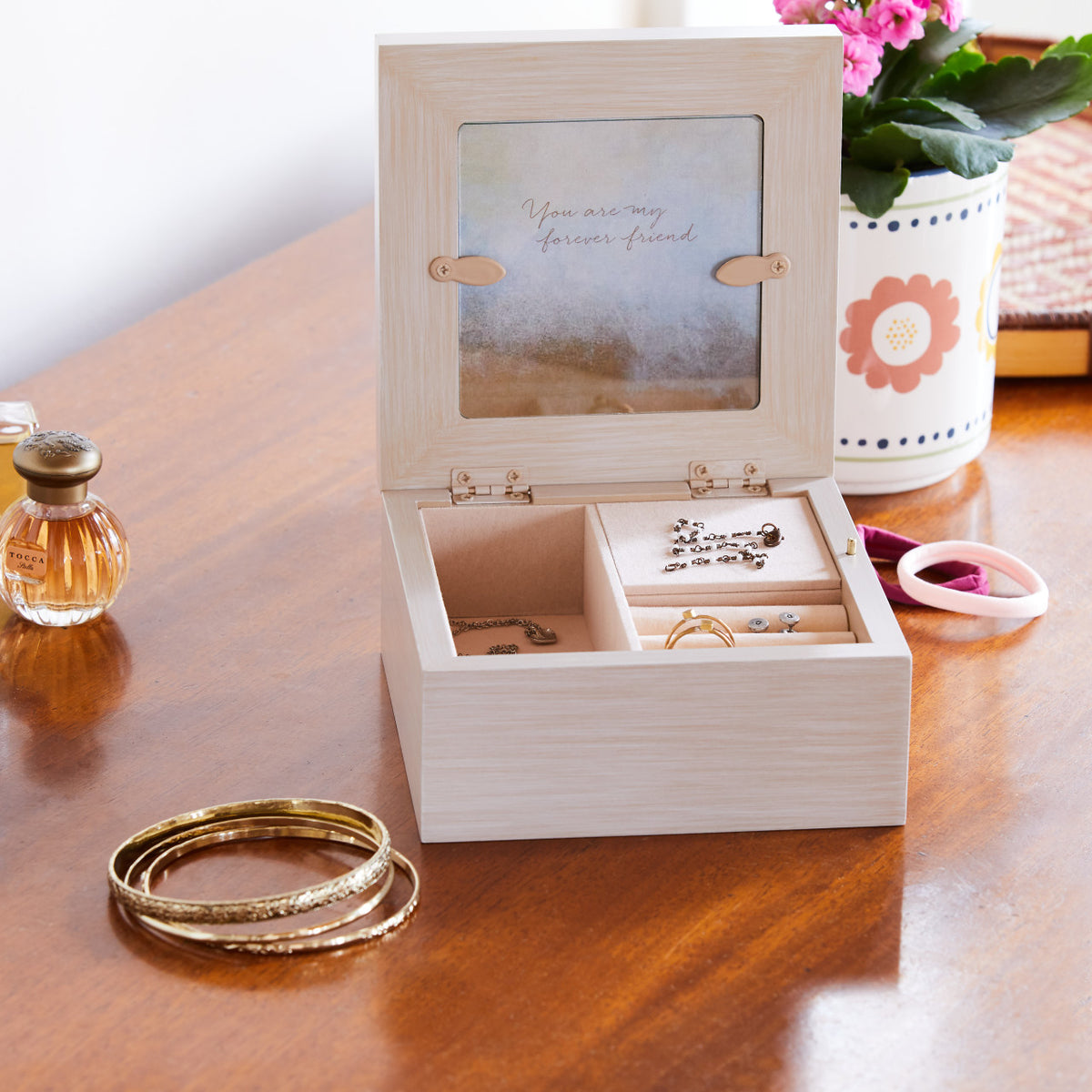 Willow Tree Friendship Music Jewelry Box, 5”sq x 2.5”h hand-painted cream wood box, open hinged lid has bas-relief resin carving of two seated figures in cream dresses, facing each other, 3.5”sq photograph fits inside lid, blush-colored fabric jewelry partitions inside